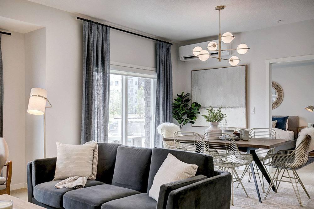 Living and dining area in a Belmont Plaza presale condo for sale in Calgary, AB